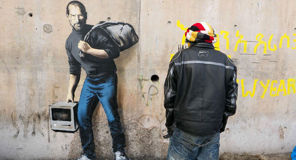 Бэнкси изобразил Джобса на стене в лагере беженцев в Кале